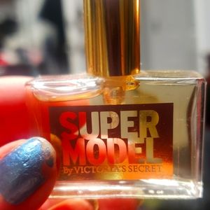 Victoria secrets mini purse size super model perfume..new